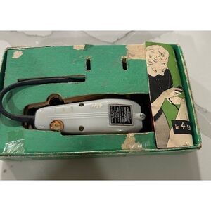 Vintage Charlescraft Professional heavy-duty clippers with a manual.